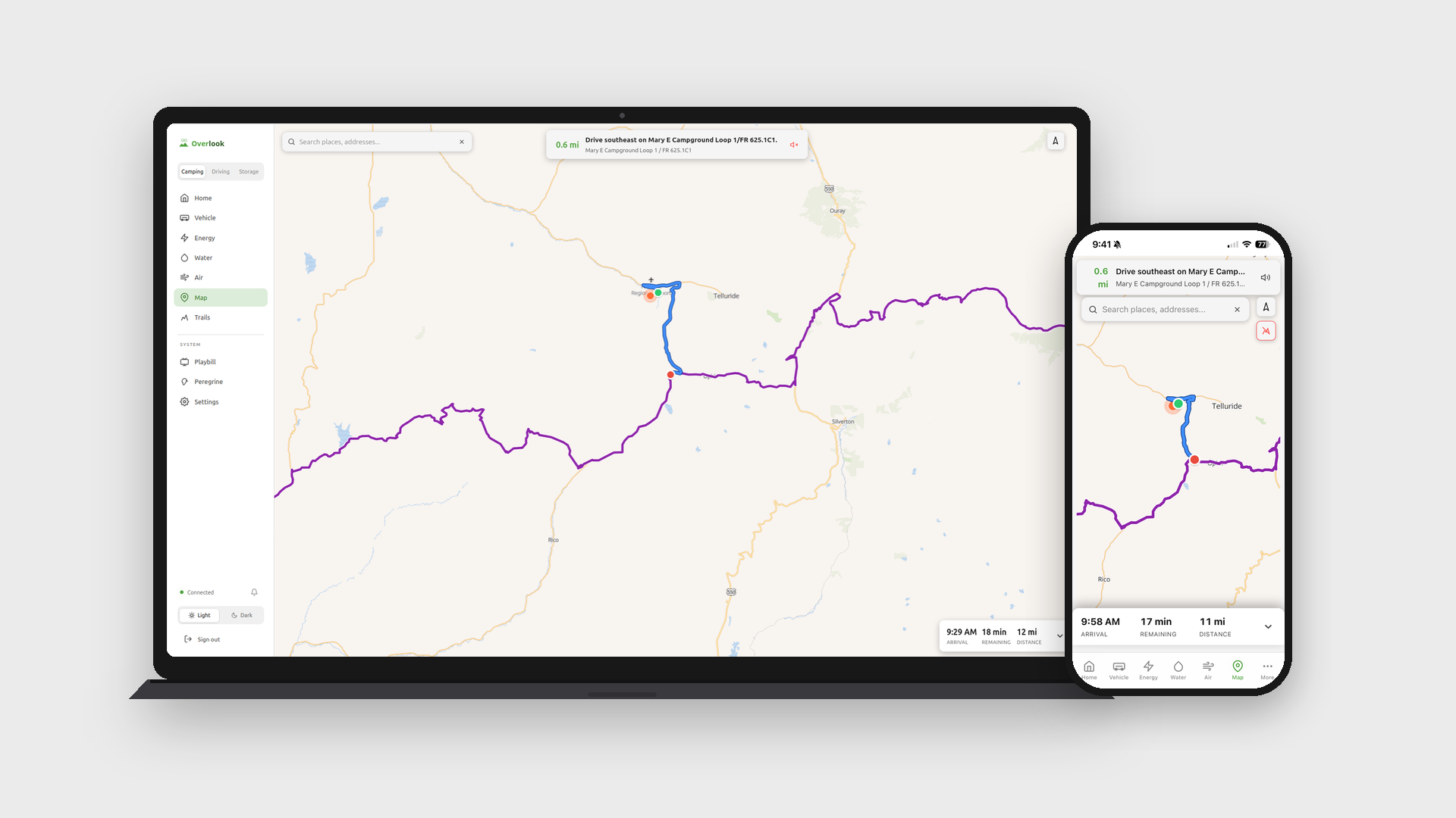 A laptop and a phone side by side, both showing Overlook's map view. A blue road route runs from a campground to a red pin near Telluride, and a longer purple track loops through the mountains for the trail portion. The phone version shows the same map with a Drive southeast on Mary E Campground banner at the top and 9:58 AM arrival, 17 minutes remaining, 11 miles across the bottom.
