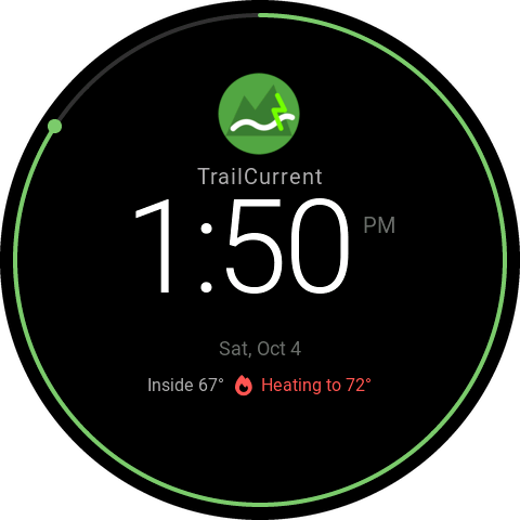 TrailCurrent clock face with the TrailCurrent logo above the time 1:50 PM and a green minute arc around the edge