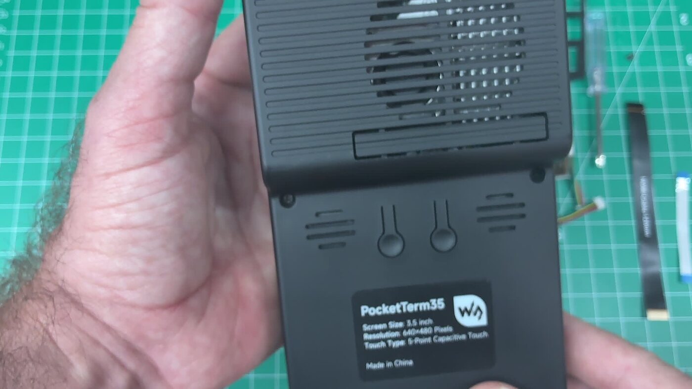 The back of a Waveshare PocketTerm35 chassis, showing the vent slots, the SD card slot and the product label reading PocketTerm35, screen size 3.5 inch, resolution 640 by 480 pixels, 5 point capacitive touch